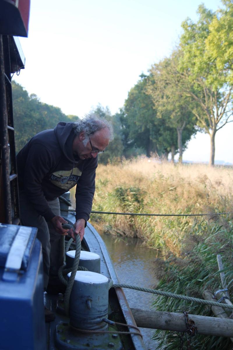 Schipper met tros